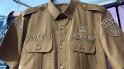 Gawat! Adek Rivai Diduga Membuat Baju Berlambang Kabid Bina Marga Pessel, Tanpa Kebijkan Atasan